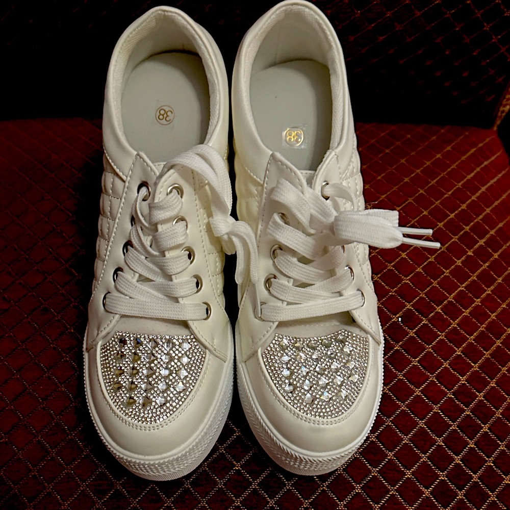 White platform, tennis shoes with crystals enhancements on the toe never worn